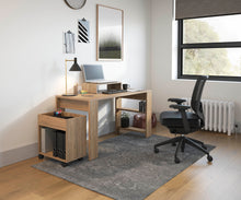 Load image into Gallery viewer, Shown: Ashton Desk in Ginger Root, Blackburn Mobile Storage Unit in Ginger Root, Blackburn Monitor Riser in Ginger Root, Carlsbad Task Chair with Arms in Black Base/Black Fabric/Black Mesh
